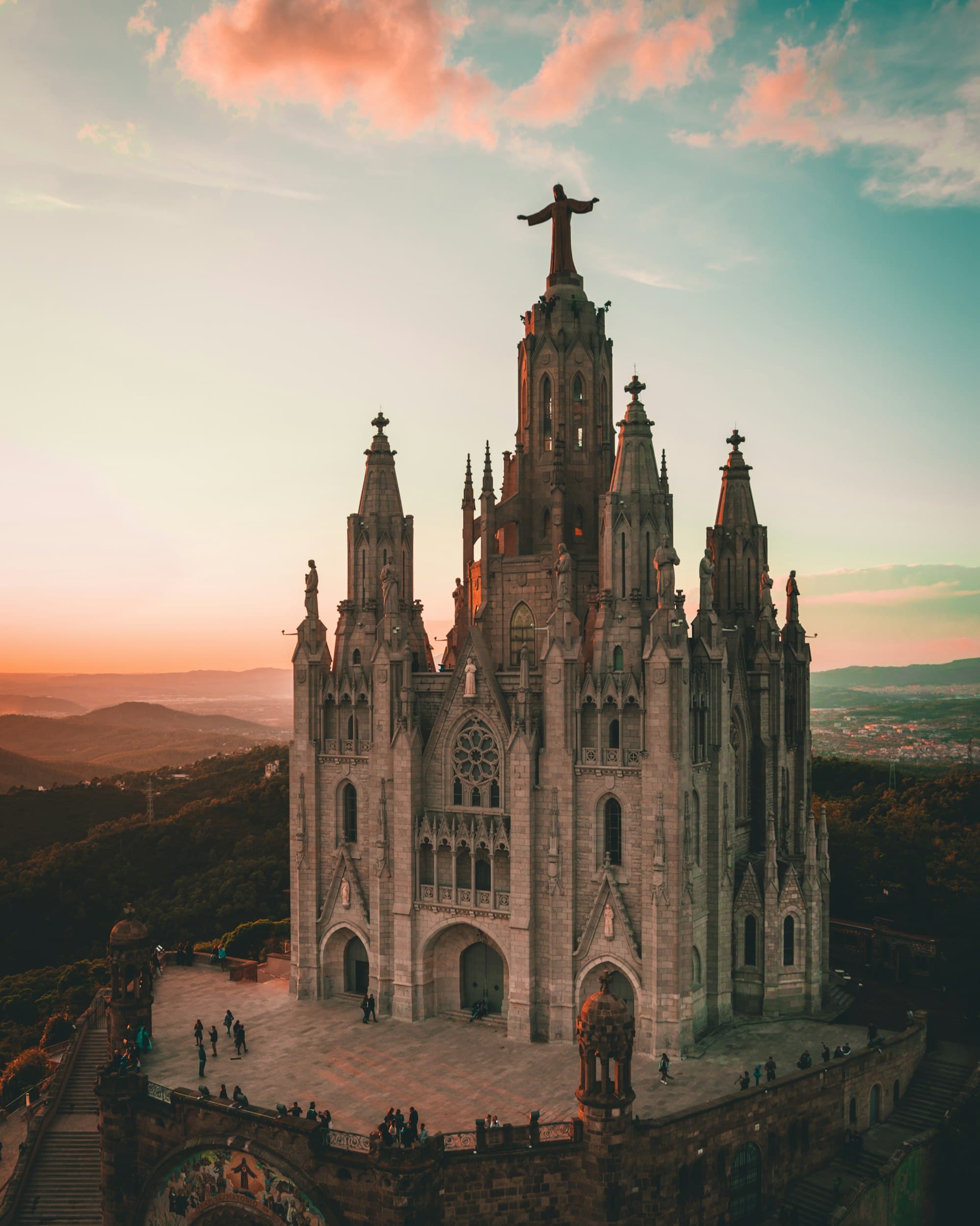Sagrada Família cathedral towers illuminated at dusk in Barcelona