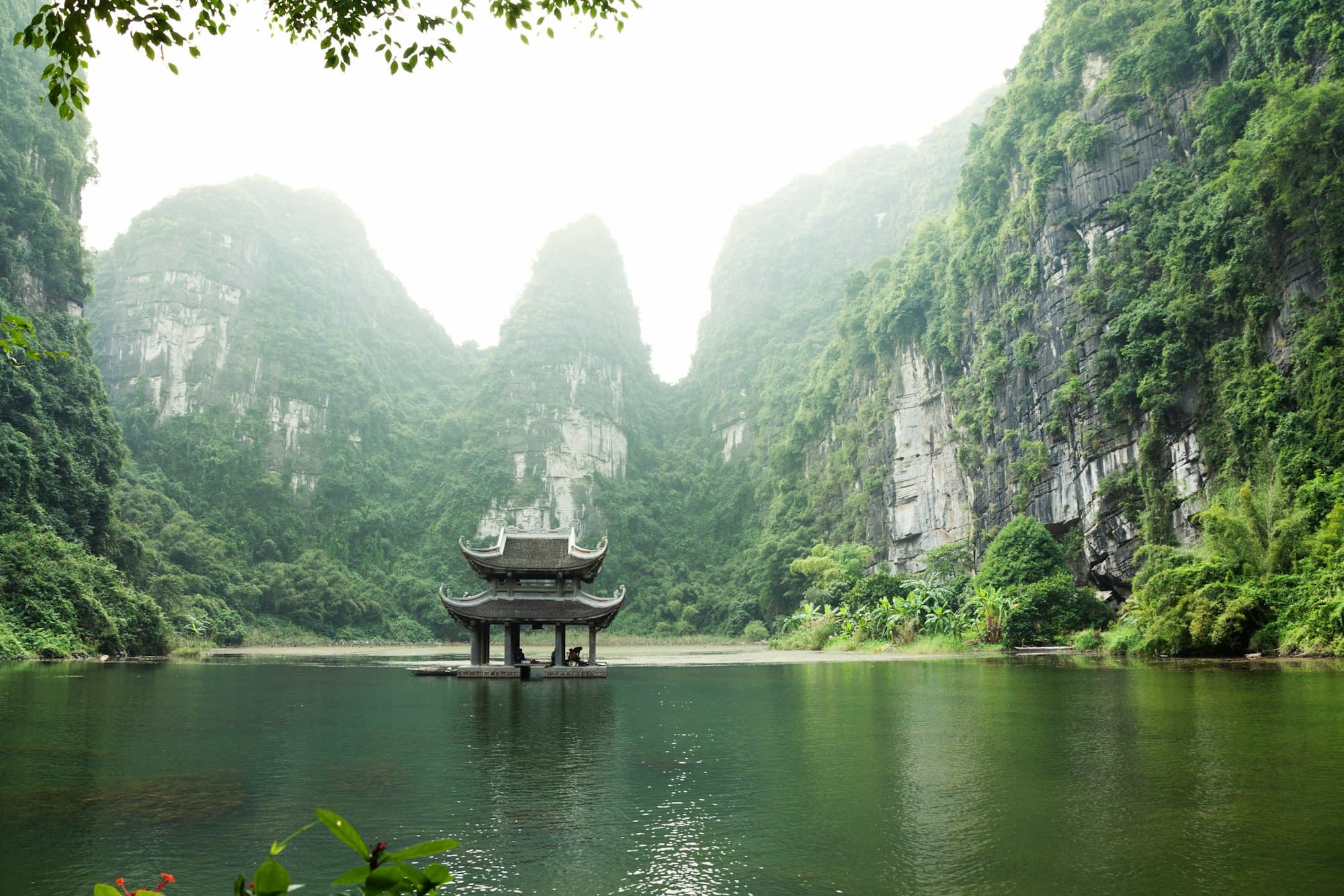 Traditional boats among limestone karsts in Ha Long Bay, Vietnam